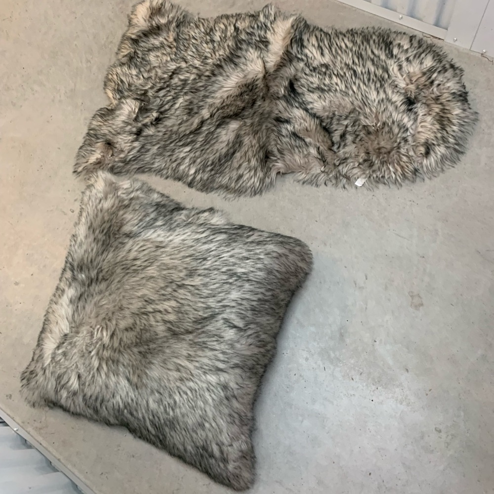 Animal print throw pillow and small rug New